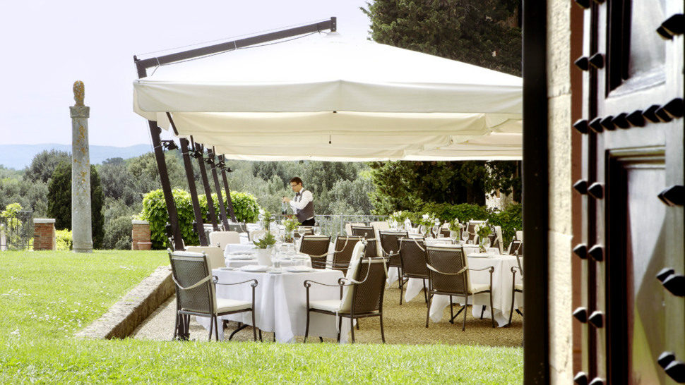 Terrace overlooking the Tuscan landscape at Borgo Scopeto